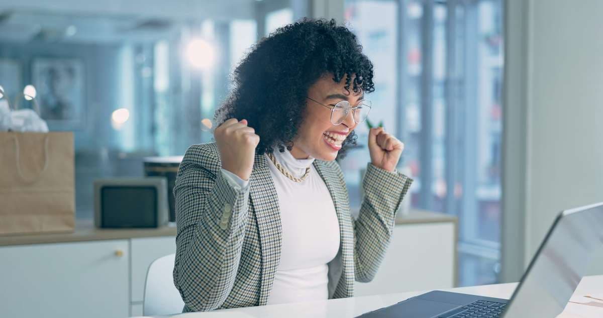 Business professional celebrating a contract win